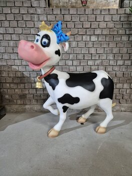 Koe cartoon blauwe strik